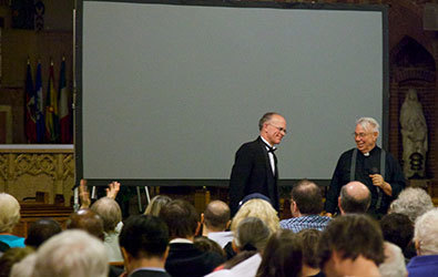 Fr. Michael Perry and Todd Wilson greet the audience at Our Lady of Refuge before performance of the Phantom of the Opera