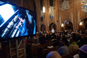 Organist Olivier Latry plays the re-dedication of the restored pipe organ at Our Lady of Refuge. October 2013. photo by Bryan Thomas.
