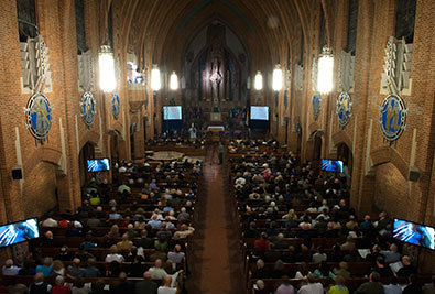 A view of the sold out nave of Our Lady of Refuge Church in Brooklyn the night of dedication of the pipe organ